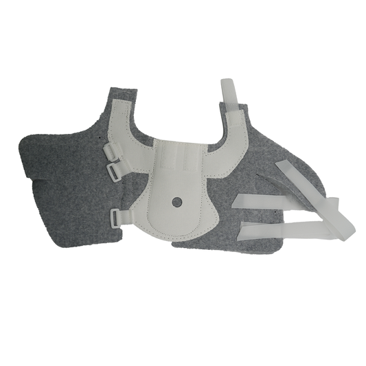 Gray orthopedic brace with adjustable white straps and a central white support panel, made in the USA, designed for comfort.