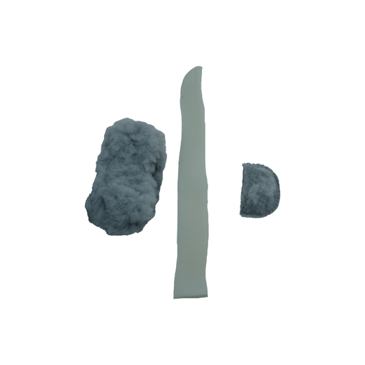 Gray fluffy rectangular pad, narrow light gray flexible strip, and small gray rounded sponge accessory arranged on white.