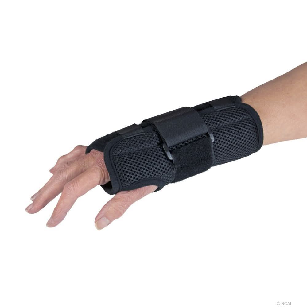 Black ambidextrous wrist brace with breathable mesh, adjustable straps, and reinforced support, made in the USA, best.