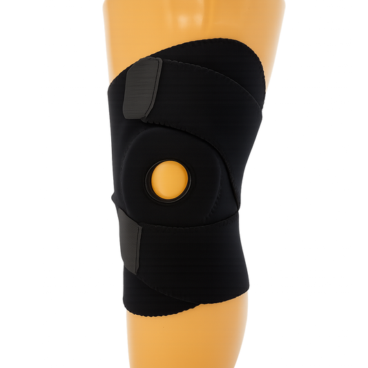 Black wrap-around knee brace with open patella and buttress support, secured by wide Velcro straps, made in the USA, top.