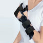 Black RCAI dorsal resting hand orthosis with finger separators, adjustable Velcro straps, worn on left hand, made in the.