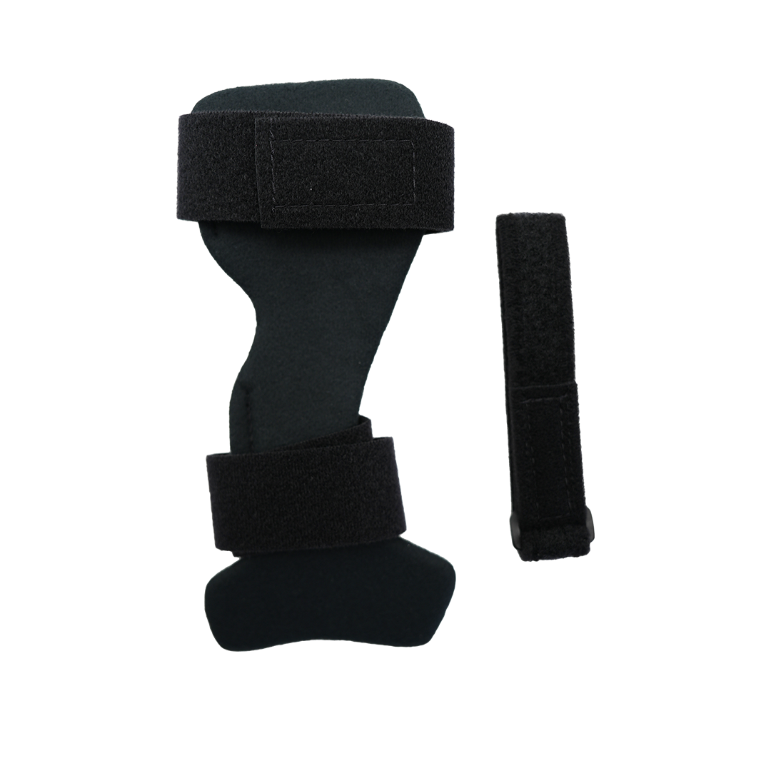 Black wrist drop orthosis with two wide adjustable hook-and-loop straps and a separate universal cuff accessory, made in the .