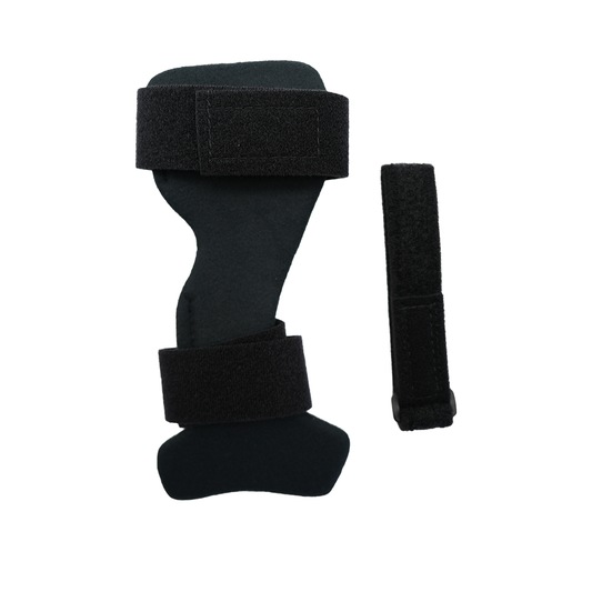 Black wrist drop orthosis with two wide adjustable hook-and-loop straps and a separate universal cuff accessory, made in the .