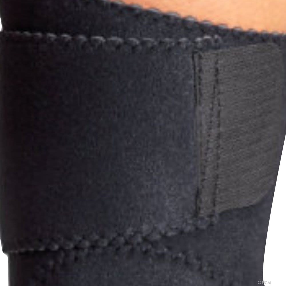 Black wrap-around knee brace with stitched edges and Velcro strap, made in the USA, RCAI, B2B orthopedics wholesale, best.