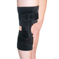 Black neoprene wrap-around knee brace with covered hinge, adjustable Velcro straps, worn on bent leg, made in the USA, best.