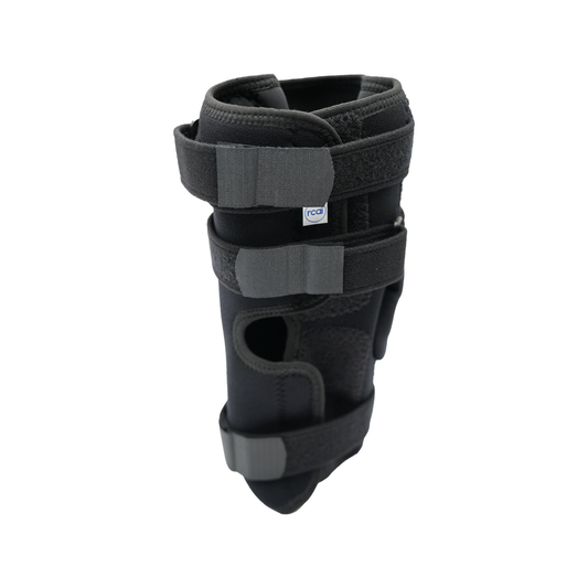 Black RCAI Deluxe Wrap Knee brace with adjustable Velcro straps and breathable mesh panels, made in the USA, ideal for B2B.