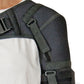 Black neoprene shoulder stabilizer with adjustable straps on a white shirt, made in the USA, RCAI, B2B orthopedics.