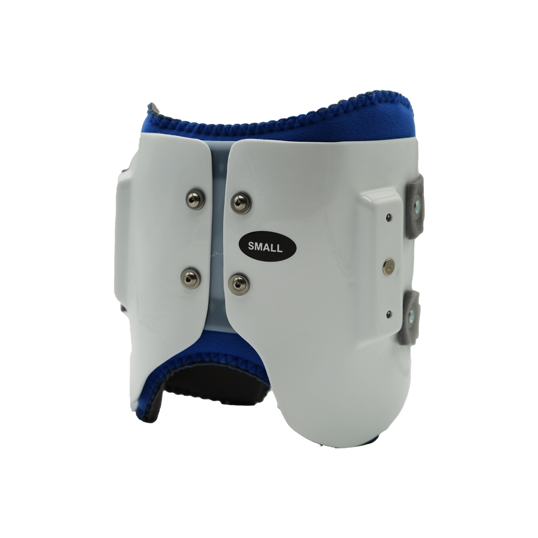 Small white orthopedic hinge assembly kit with blue padded interior, metal rivets, and adjustable side hinges, made in the.