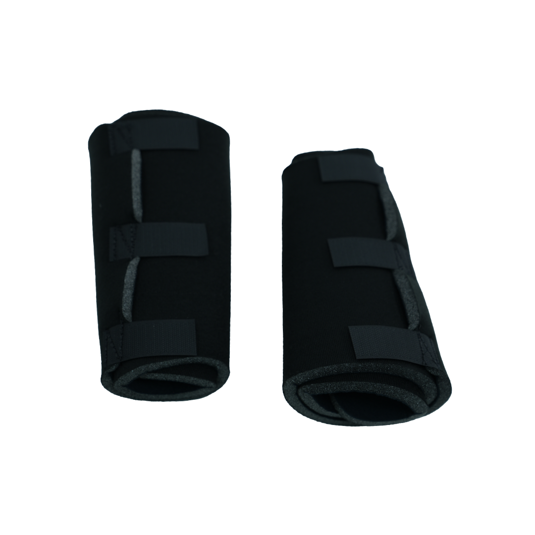 Pair of black pediatric knee brace sleeves with gray interior lining and adjustable Velcro straps for support and comfort.
