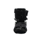 Black universal pediatric leg brace with adjustable Velcro straps and metal hinges, designed for optimal support, made in.